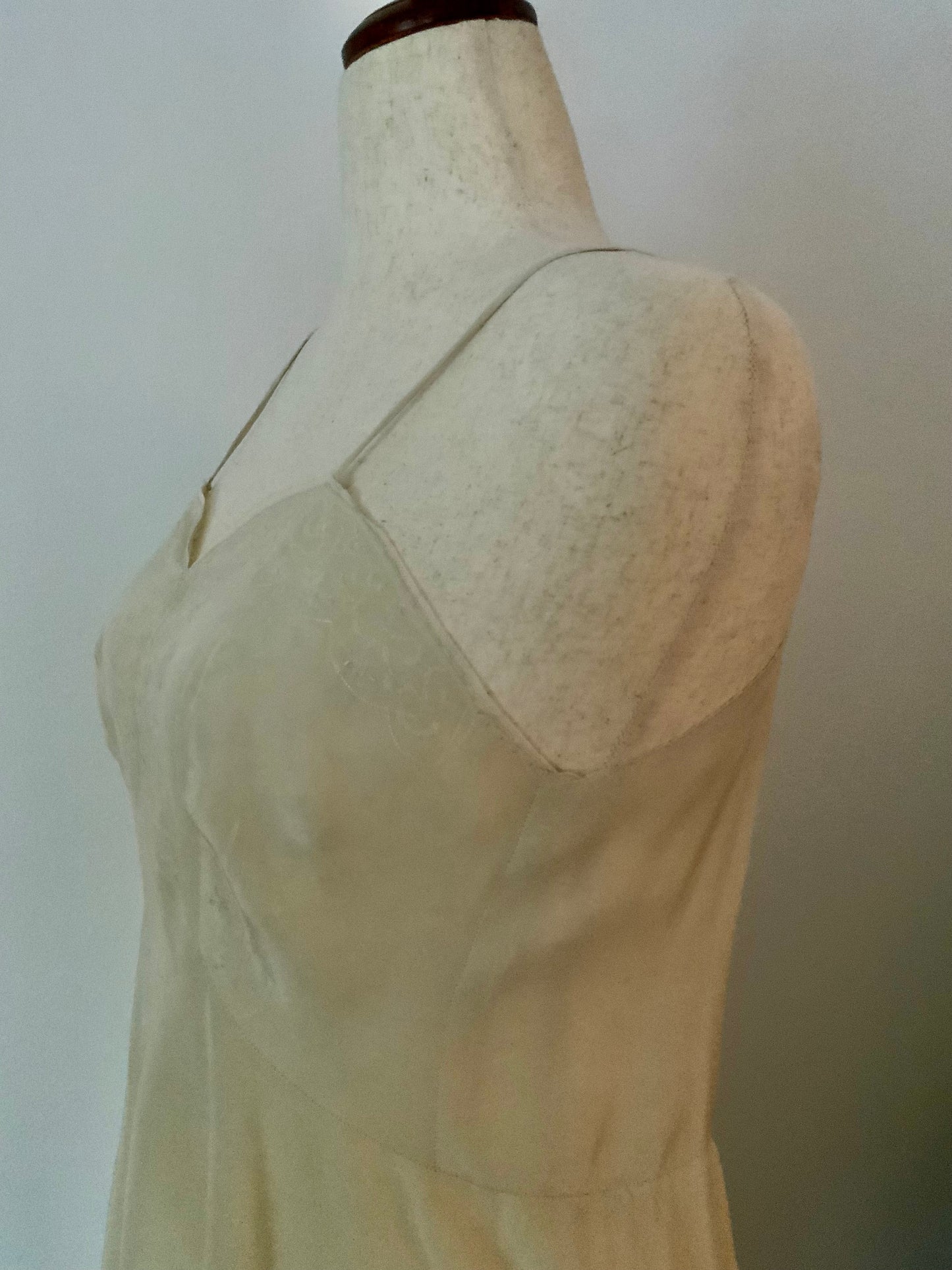 Antique silk lingerie slip, circa 1918–1922, featuring rare open-back drawstring construction and hand-embroidered bust panels- 20AR