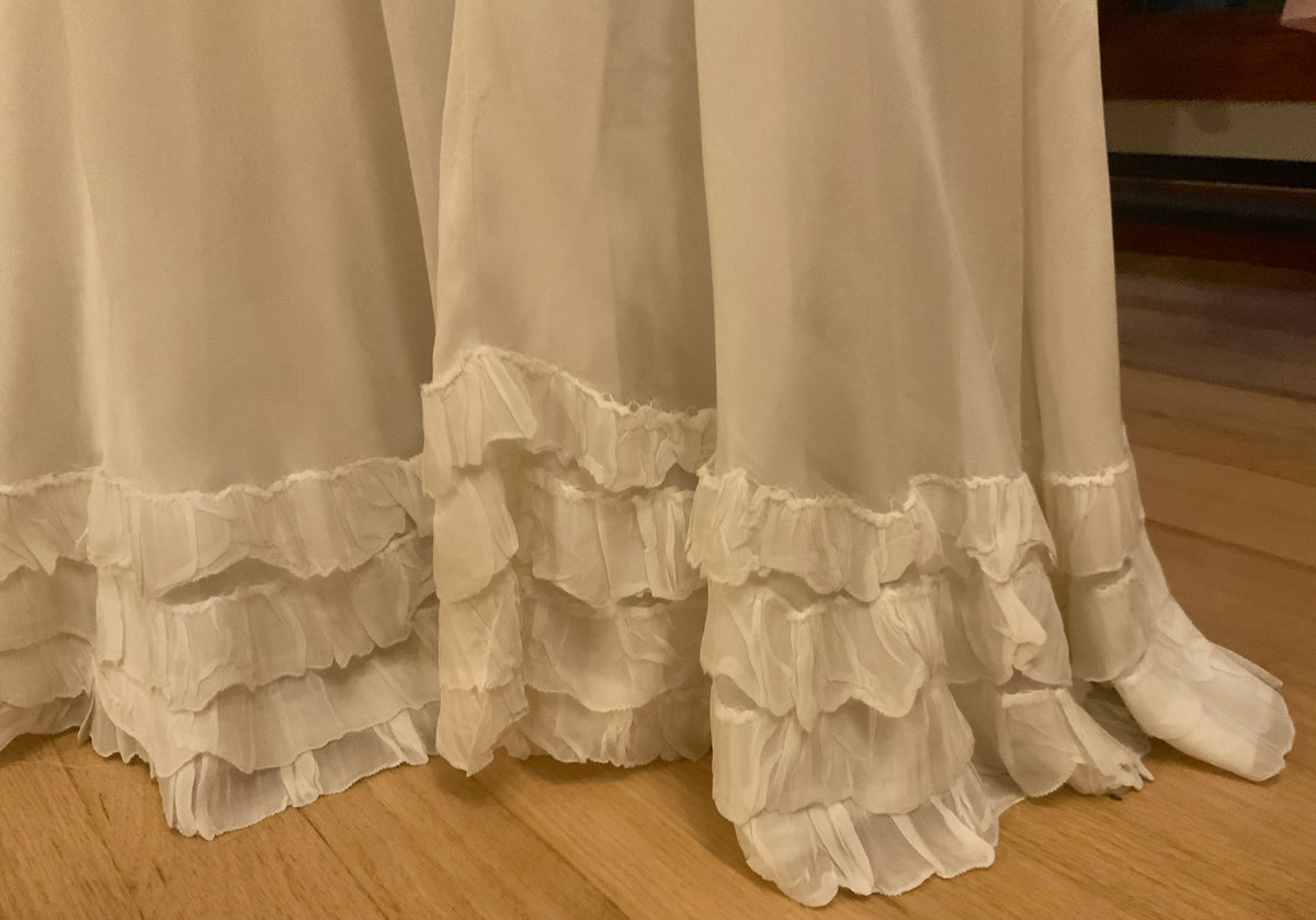 Antique Ivory Chiffon Gown with Ruffled Hem and Lace Appliqué.20ARR