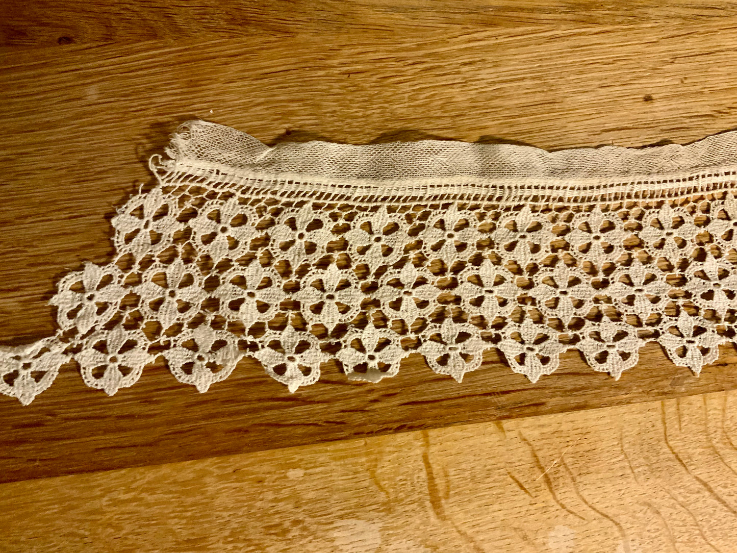 Antique lace collar or trim with delicate floral pattern, ideal for styling, layering, or textile restoration projects.