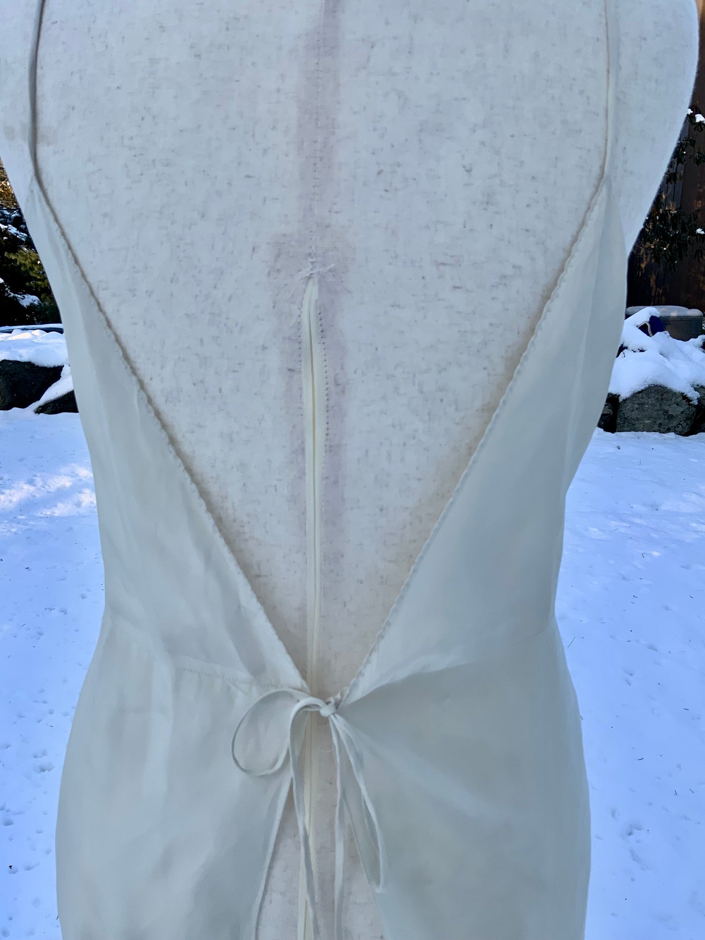 Antique silk lingerie slip, circa 1918–1922, featuring rare open-back drawstring construction and hand-embroidered bust panels- 20AR