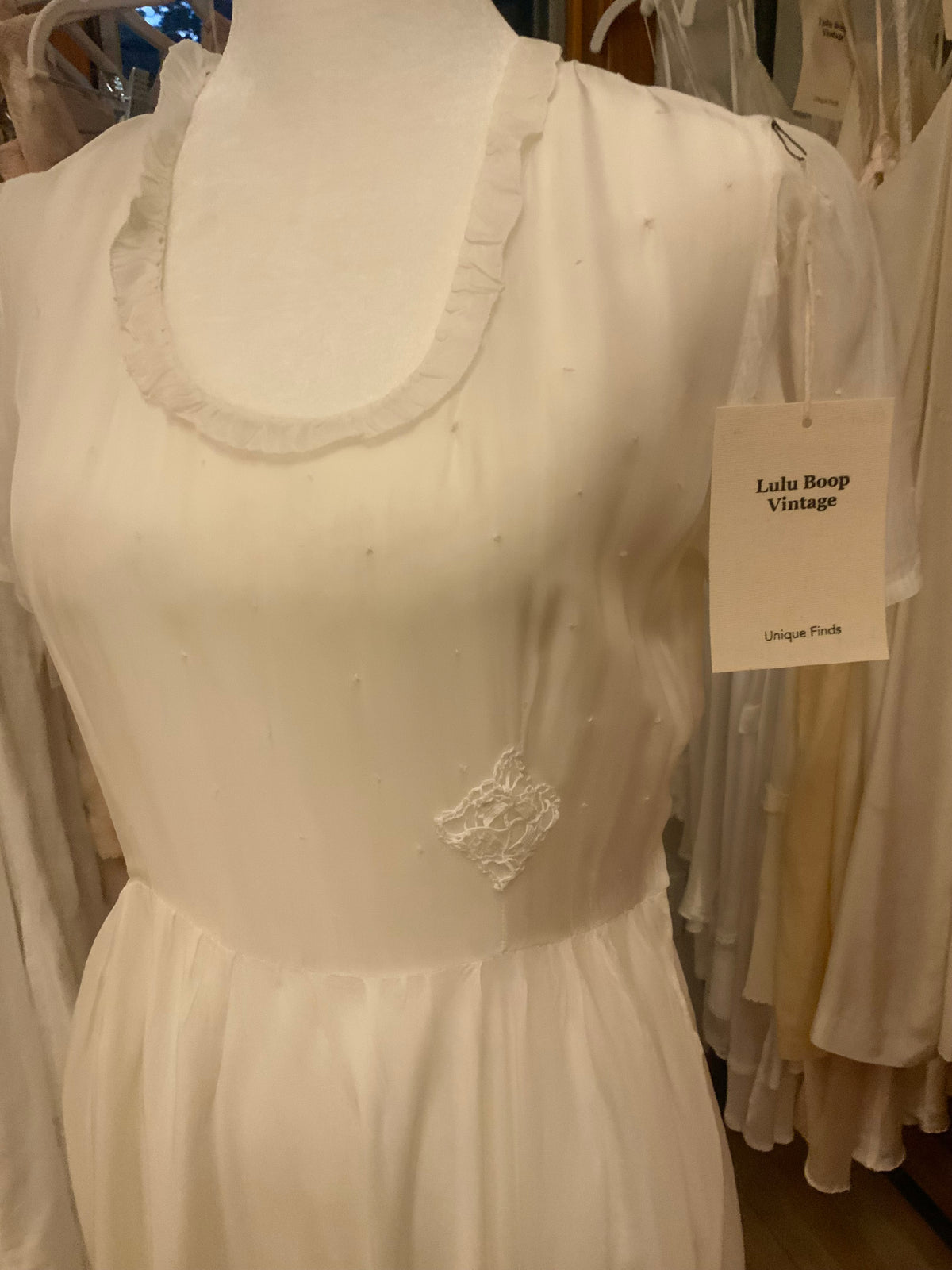 Antique Ivory Chiffon Gown with Ruffled Hem and Lace Appliqué.20ARR