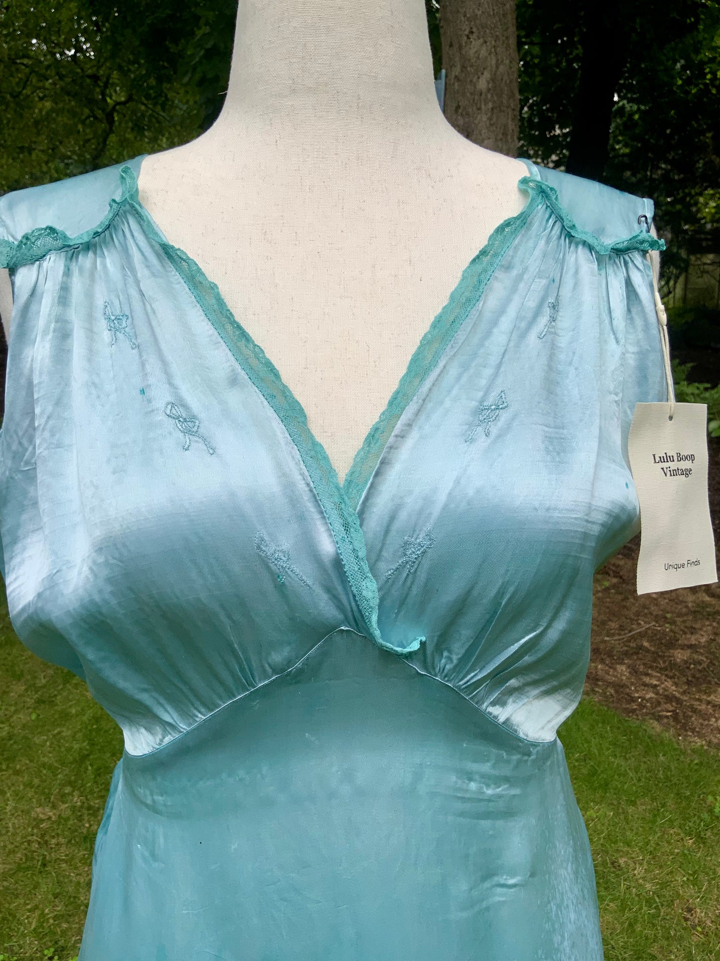 1930s Hand-Dyed Aqua Satin Nightgown. Embroidered Bow Lace Gown with Original Tie Belt
.30CU