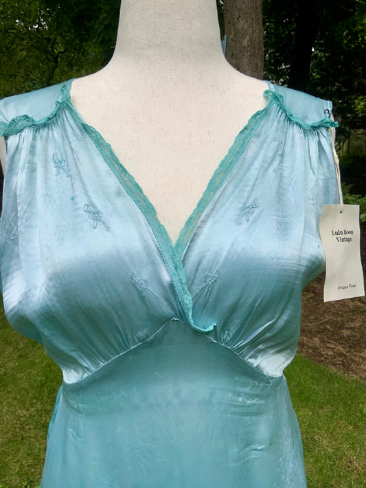 1930s Hand-Dyed Aqua Satin Nightgown. Embroidered Bow Lace Gown with Original Tie Belt
.30CU