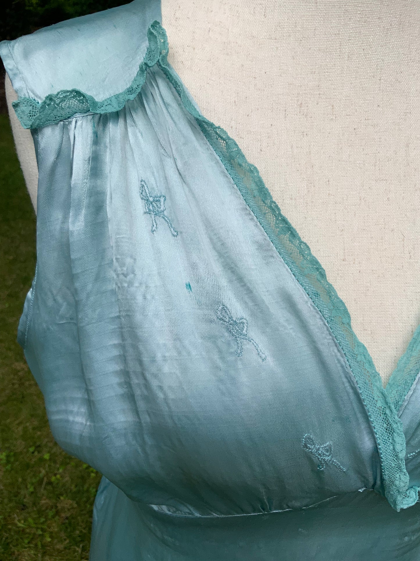 1930s Hand-Dyed Aqua Satin Nightgown. Embroidered Bow Lace Gown with Original Tie Belt
.30CU