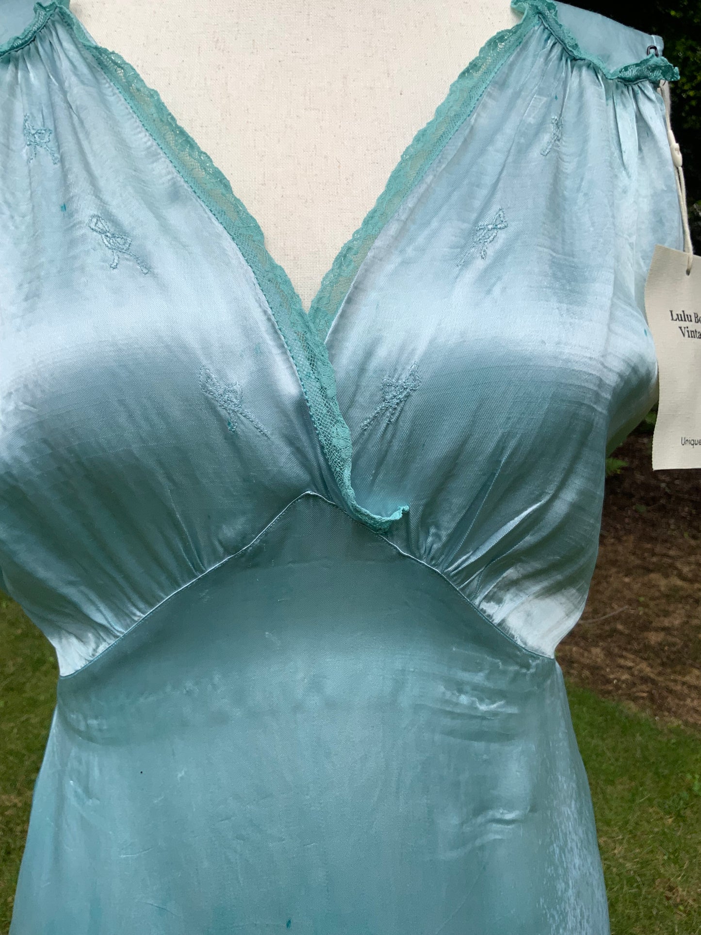 1930s Hand-Dyed Aqua Satin Nightgown. Embroidered Bow Lace Gown with Original Tie Belt
.30CU